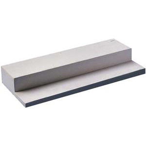 The Athletic Specialties Step Down Pitcher's Rubber (PRS) by Athletic Specialties is a silver-colored, rectangular metal block with smooth surfaces and sharp edges, measuring 6” x 24”, ideal as a regulation-size pitching tool.