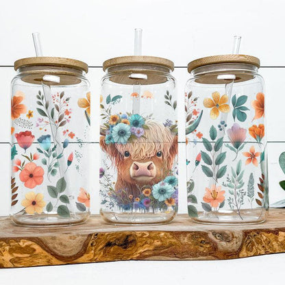 Libby Glass Can Tumbler with baby Highland cow and flower artwork, charming gift for friends.