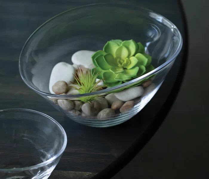 Medium Simon Pearce Barre Bowl from the 2206 Serveware collection, shown filled with fruit in a stylish kitchen setting.