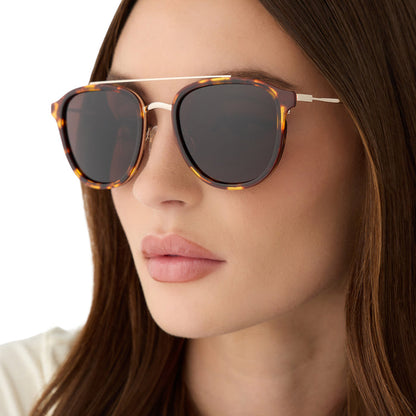 on model - female wearing diff eyewear featuring the camden aviator sunglasses with a rich tortoise frame and brown polarized lenses angled view