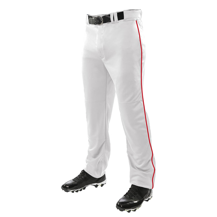 A person wearing Champro Sports Champro Youth Triple Crown Open Bottom Baseball Pants with Piping (BP91UY), featuring double knit polyester and a red stripe, plus a black belt and cleats, stands against a white background.