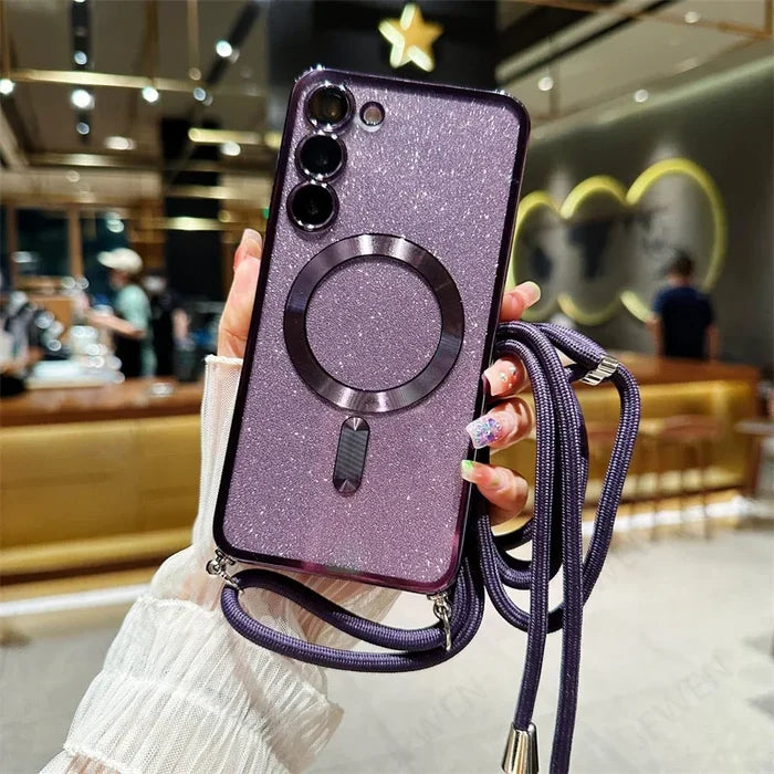 Purple glittery smartphone case with a circular magnetic ring and attached lanyard.