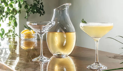 Simon Pearce Cloud Carafe with a sleek, modern design, featuring a smooth, cloud-like shape and clear glass finish.