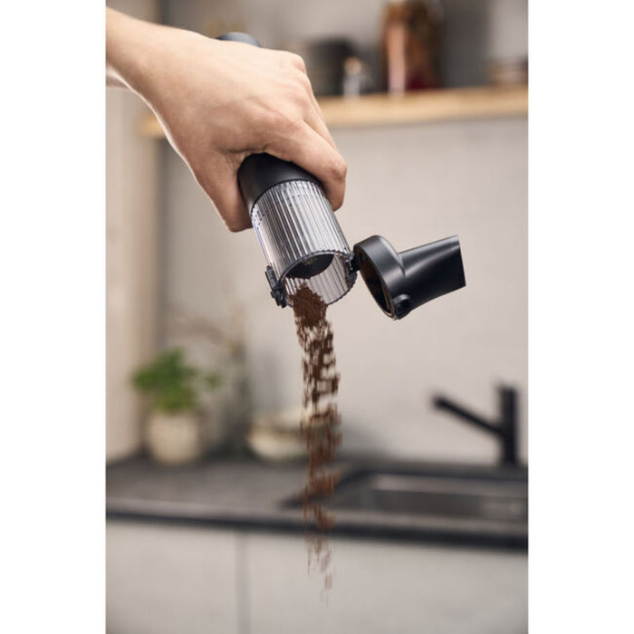 Cordless Vacuum Cleaner being emptied