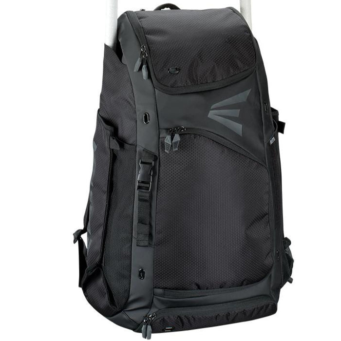 The Easton E610 Catcher's Backpack (E610CBP CATBP) by Easton is a spacious black bag with multiple zippered compartments, mesh side pockets, and an angular front design—perfect for baseball or catcher’s gear—shown upright against a white background.