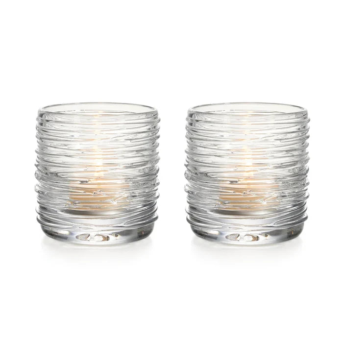 Set of two Simon Pearce Echo Lake tealight holders with clear glass and textured design for home decor.