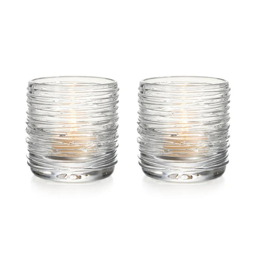 Set of two Simon Pearce Echo Lake tealight holders with clear glass and textured design for home decor.