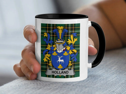 White mug with black rim featuring a blue and yellow crest with the name "Holland".
