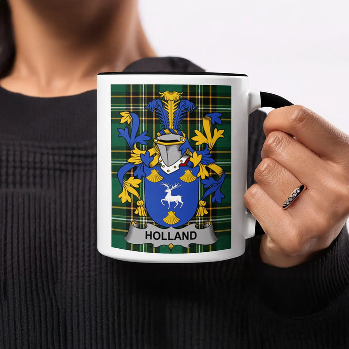 Mug with Holland family crest on plaid background.