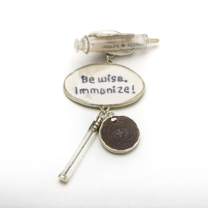 Statemeant2020 sterling silver, vintage snakebite kit, hand embroidered wool, canine vaccination tag