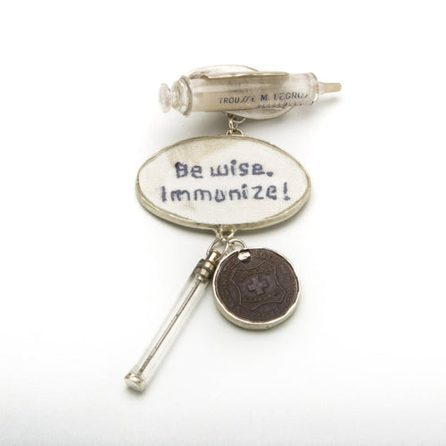 Statemeant2020 sterling silver, vintage snakebite kit, hand embroidered wool, canine vaccination tag