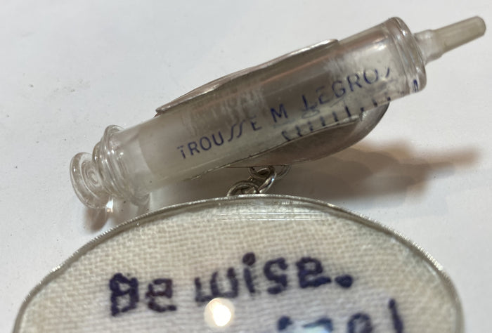 Statemeant2020 sterling silver, vintage snakebite kit, hand embroidered wool, canine vaccination tag