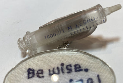 Statemeant2020 sterling silver, vintage snakebite kit, hand embroidered wool, canine vaccination tag