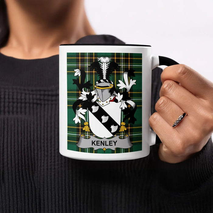 Mug with the Kenley family crest on a tartan background.