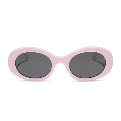 diff eyewear featuring the lainey oval sunglasses with a powder pink frame and grey polarized lenses front view