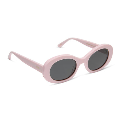 diff eyewear featuring the lainey oval sunglasses with a powder pink frame and grey polarized lenses angled view