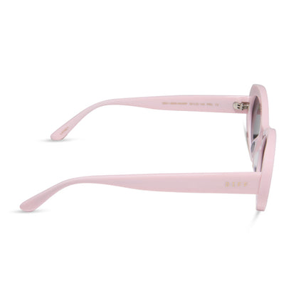 diff eyewear featuring the lainey oval sunglasses with a powder pink frame and grey polarized lenses side view