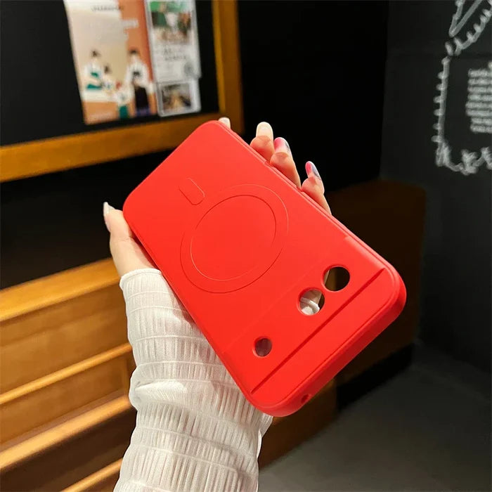 Red smartphone case with a cartoon-like face design.