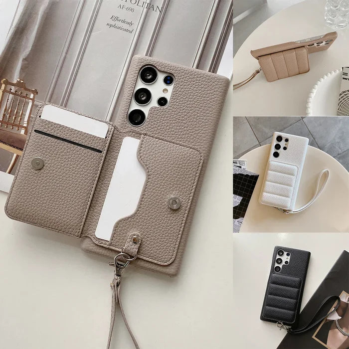 Leather phone case with built-in card holder and wrist strap.