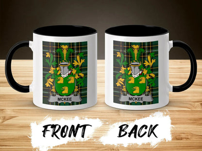 Two mugs with a green and yellow crest and "MCKEE" text.
