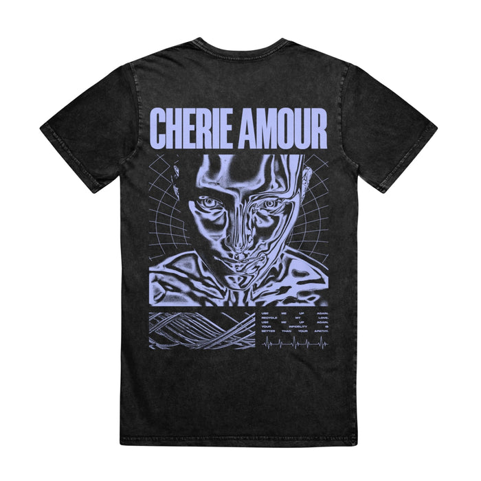 Back of black short sleeve shirt with CHERIE AMOUR written across the top in periwinkle font. Below that is a drawing of a face and the top of their shoulders.