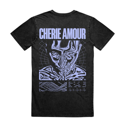 Back of black short sleeve shirt with CHERIE AMOUR written across the top in periwinkle font. Below that is a drawing of a face and the top of their shoulders.