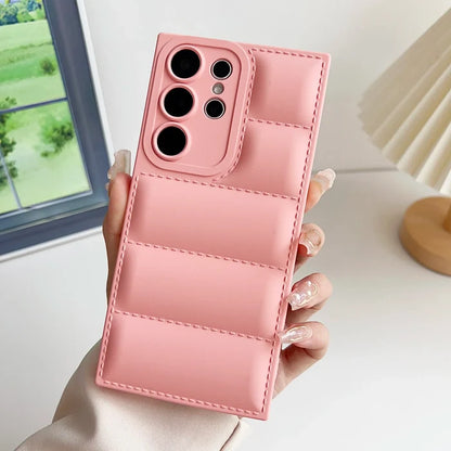 A woman holding a pink iphone case