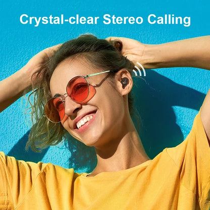 Smiling woman wearing wireless earbuds.