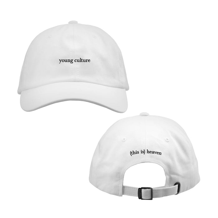 Plain White Dad Hat with "young culture" written on front with in black lowercase lettering. On back "(this is) heaven" is written in black lowercase lettering.