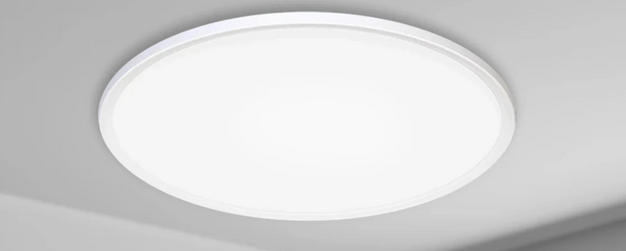 Round, white ceiling light.