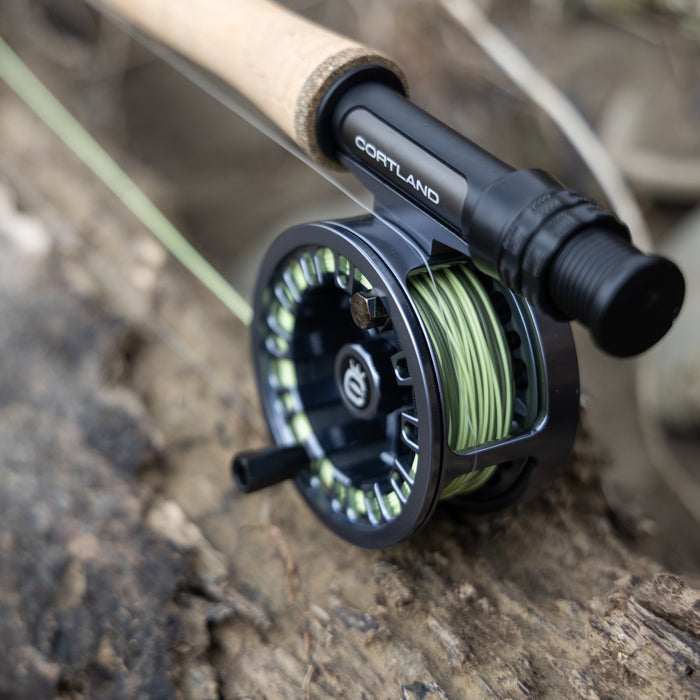 Cortland Ultralight II on a fishing reel on a wooden surface