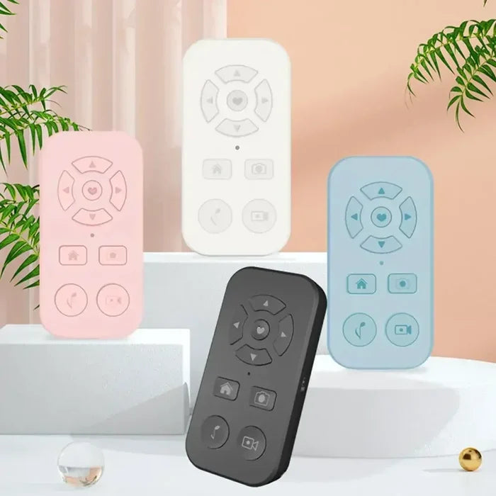 Set of colorful remote controls with minimalist designs and circular button layouts.
