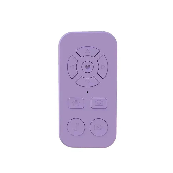 Lavender-colored remote control with circular and rectangular buttons.