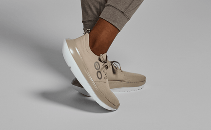 Women's OOmy Stride - Nomad model posing in studio | lifestyle