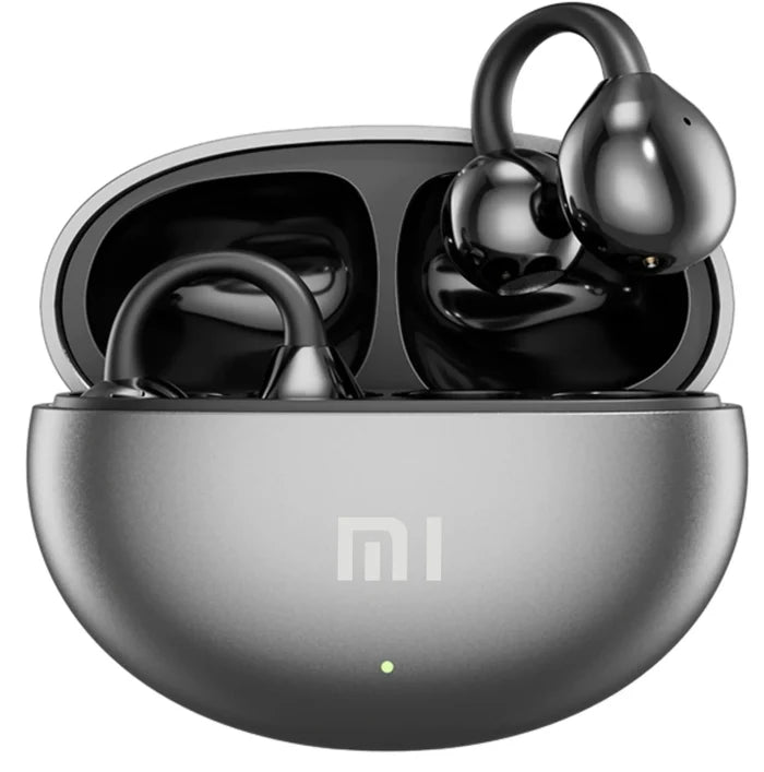Wireless earbuds in a charging case with the Xiaomi (Mi) logo visible.