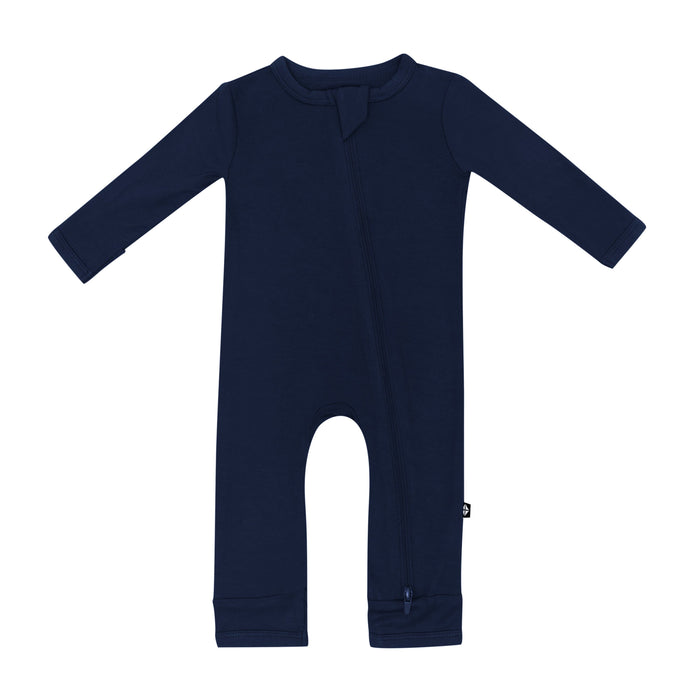 Flat lay of Kyte Baby Zippered Romper in Navy